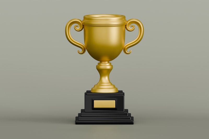Piala emas sebagai ilustrasi turnamen slot akhir pekan